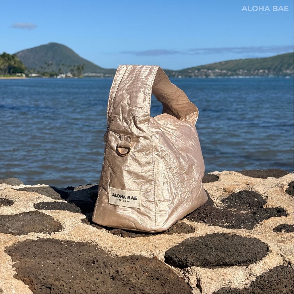 Aloha Bae champagne-colored hobo bag with adjustable strap and soft leather texture, stylish and spacious for everyday use.