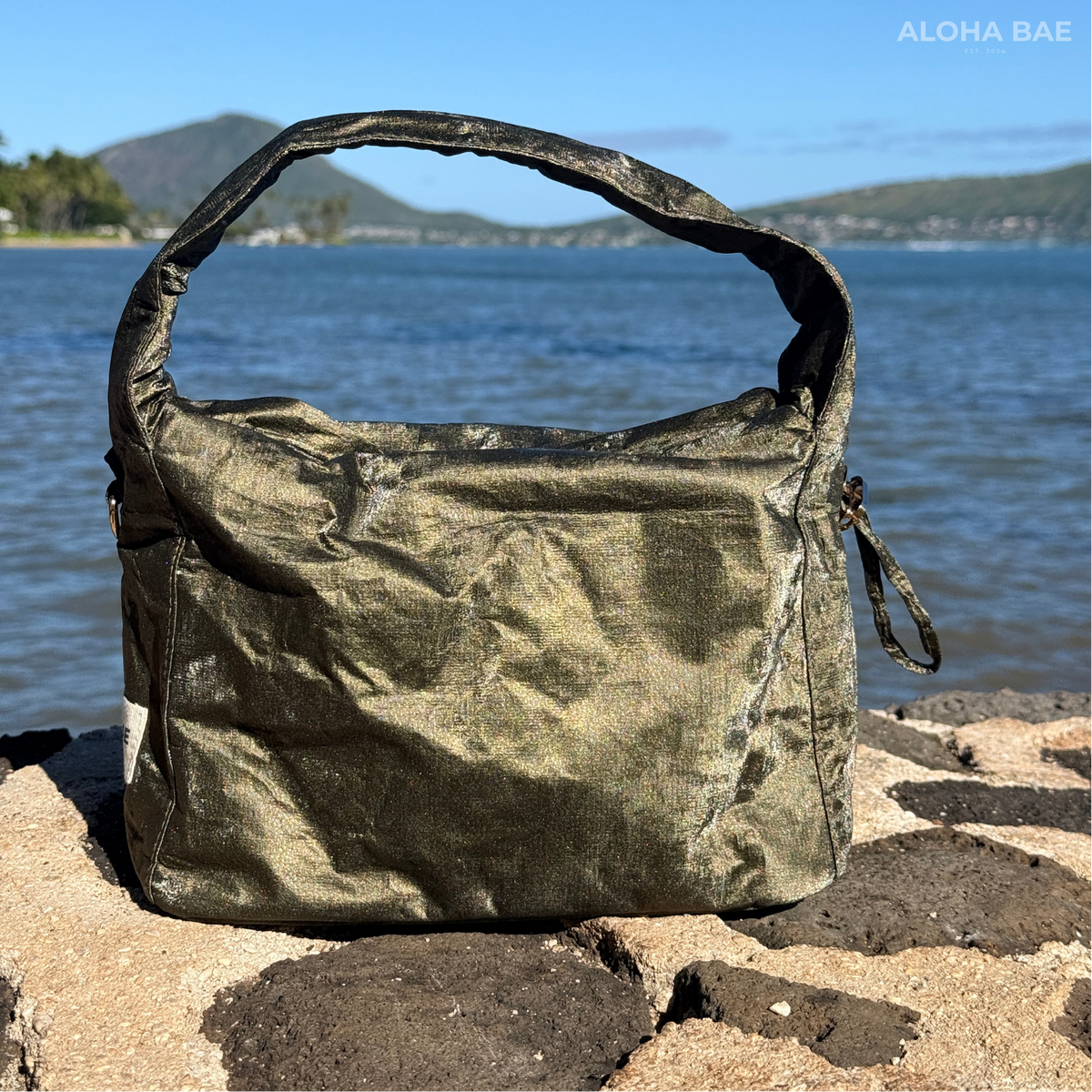 Aloha Bae Maritime Pine hobo bag in stylish woven design with leather strap and nautical-inspired detailing.
