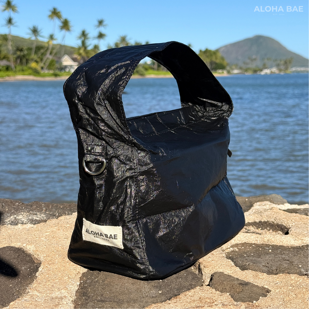 Aloha Bae matte black hobo bag with a slouchy silhouette, featuring a single shoulder strap and minimalist design.