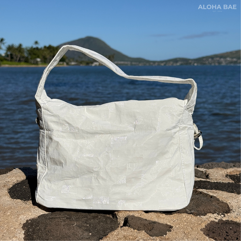 Aloha Bae white plaid hobo bag with a slouchy style, featuring a spacious design and adjustable shoulder strap.
