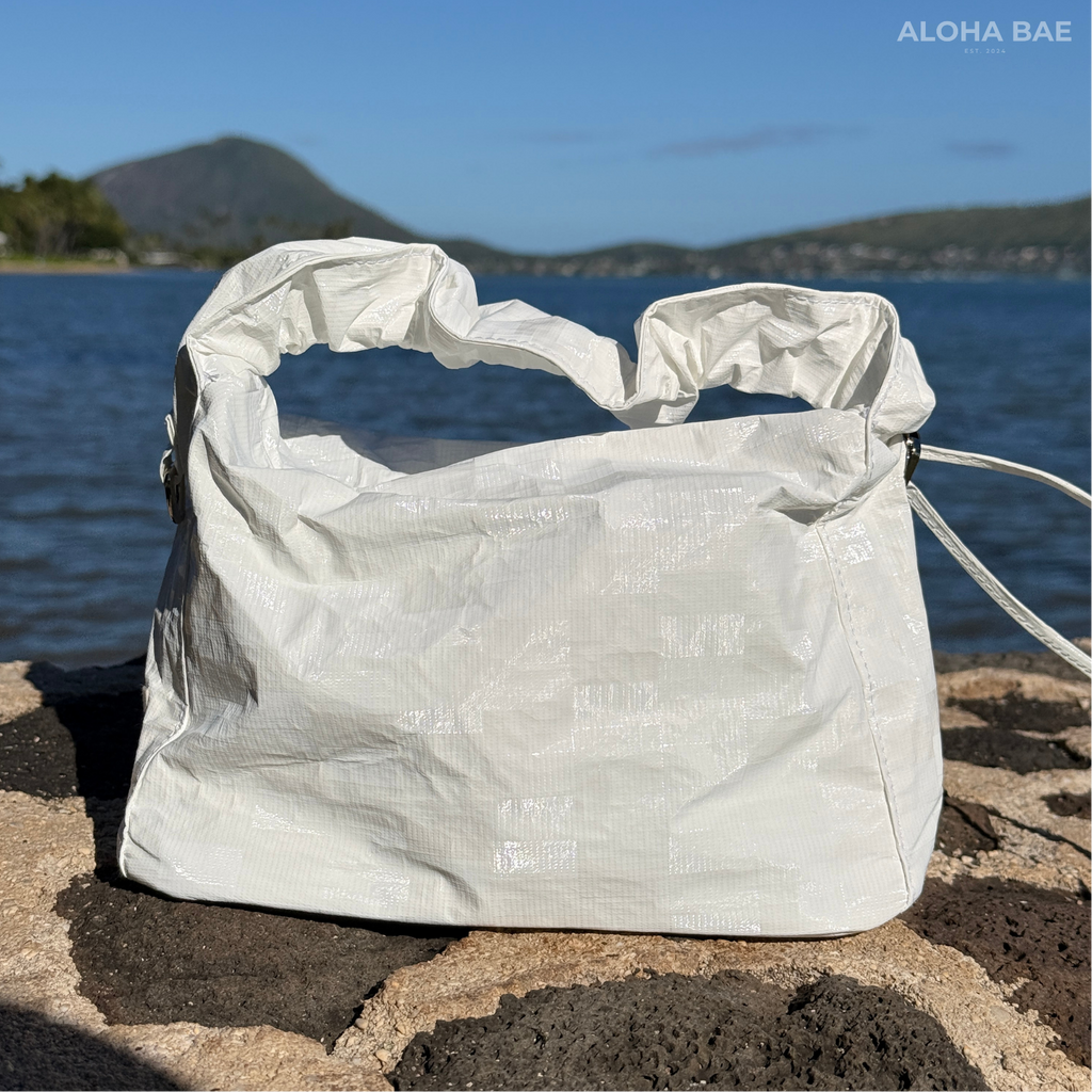 Aloha Bae white plaid hobo bag with soft leather handles and spacious interior, stylish accessory for casual and everyday use.