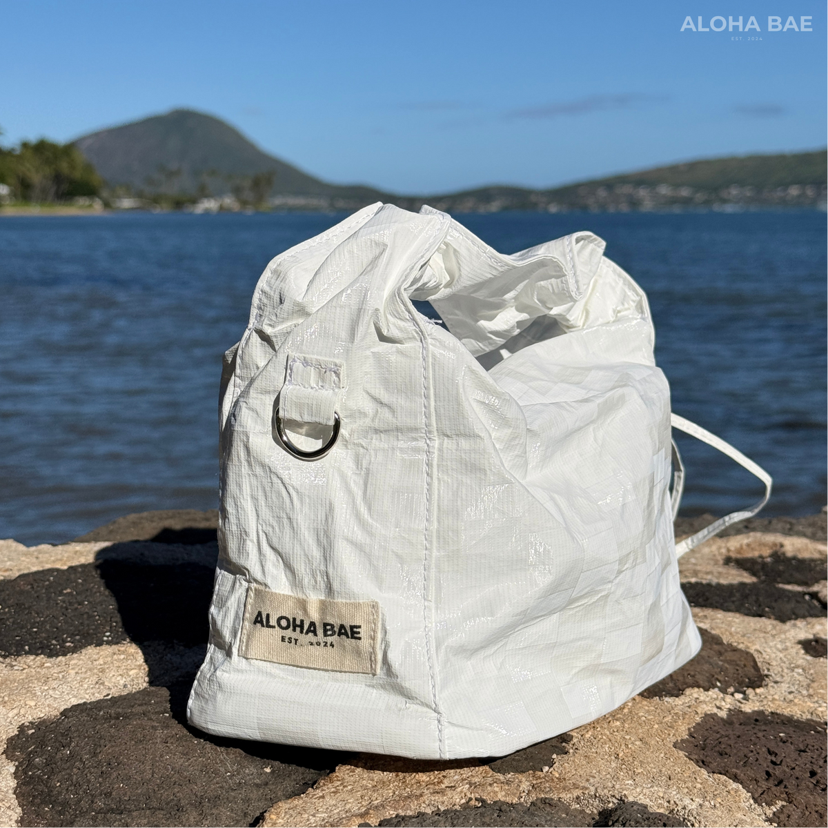 Aloha Bae white plaid hobo bag with shoulder strap, featuring a casual, stylish design and soft fabric texture.
