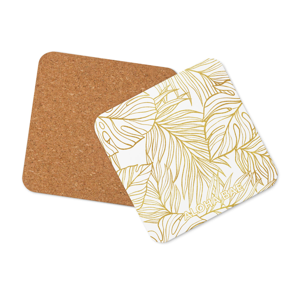 White gold monstera cork-back drink coaster featuring a tropical monstera leaf design, perfect for protecting surfaces.