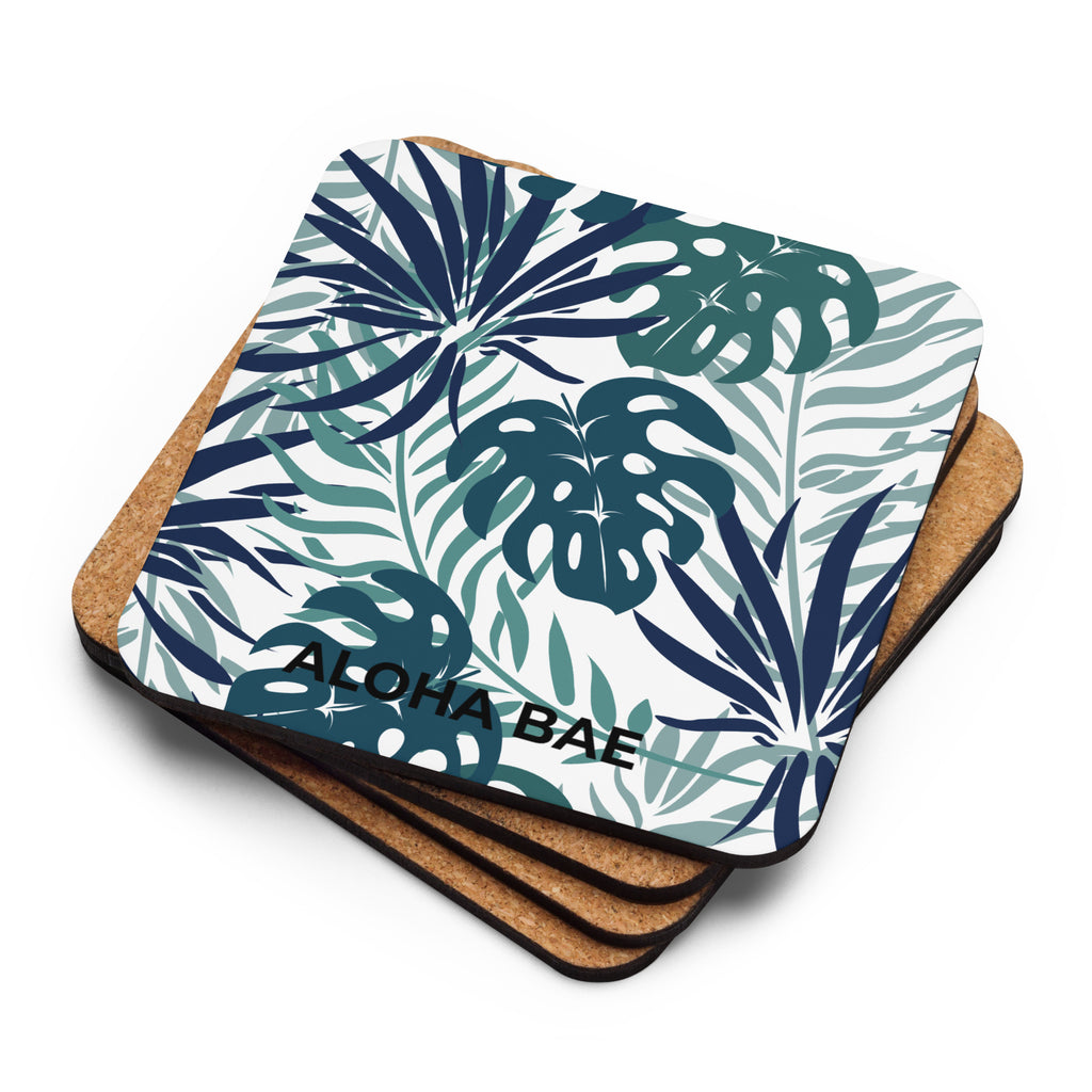 A sea green Tropics cork-back drink coaster with tropical leaf design, made by alohabae, showing the detailed front surface.