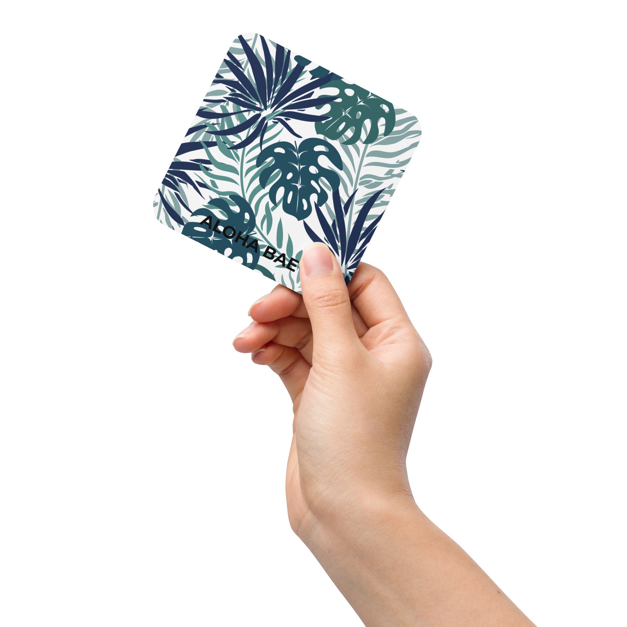 Sea green cork-back drink coaster with tropical print from alohabae, showing a vibrant, patterned surface and cork backing for protection.