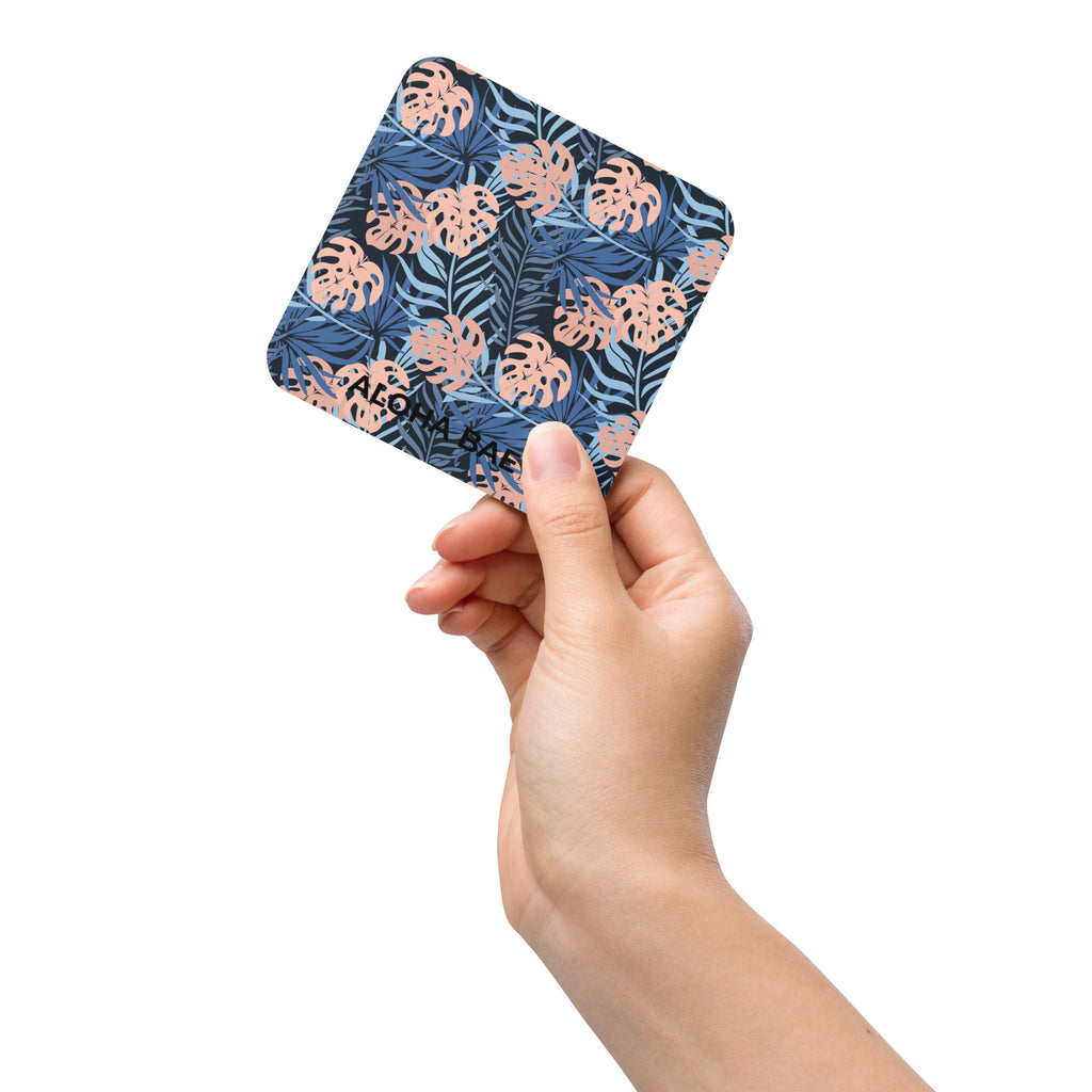 AlohaBea midnight tropics cork-back drink coaster with tropical design and cork backing for protecting surfaces.